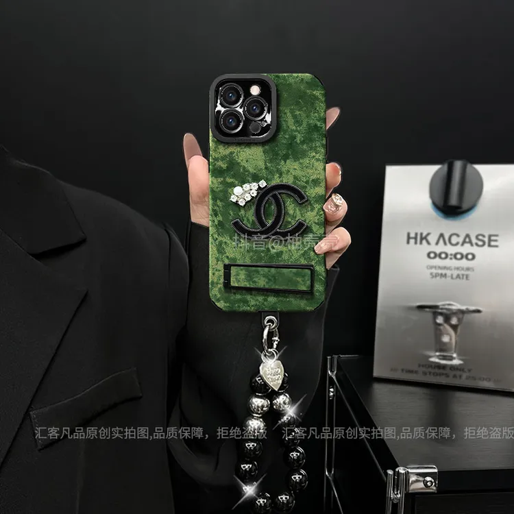 适用【苹果/oppo/华为/vivo/小米】瞳眼复古绿防摔支手链手机壳女款