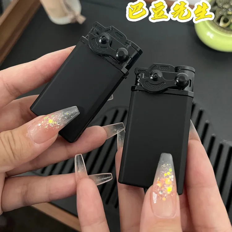 巴豆先生摇臂点火蓝焰直冲创意个性可定制防风充气金属打火机