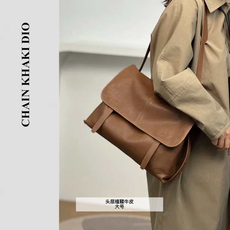 头层植鞣牛皮邮差包包2025新款单肩包通勤腋下背包秋冬真皮斜挎包