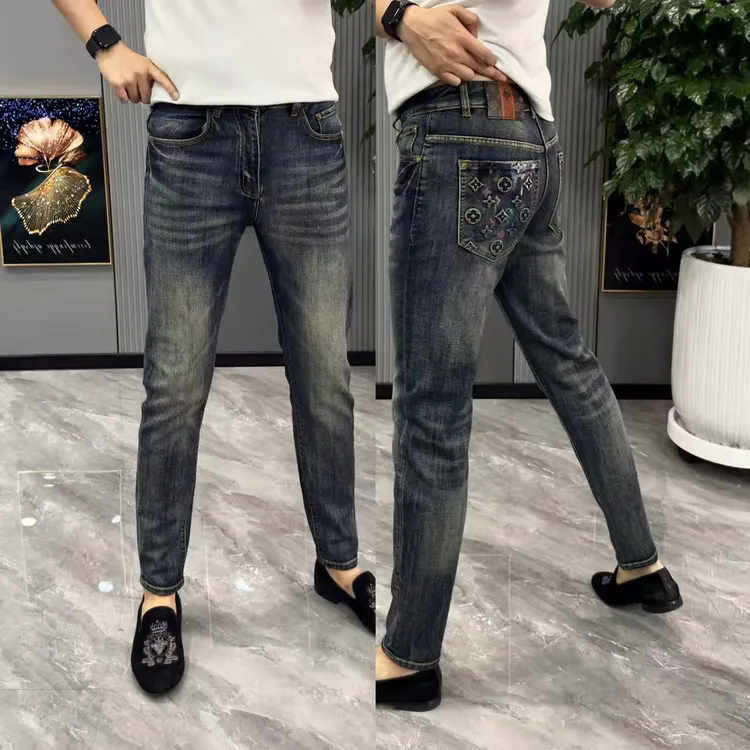 牛仔裤男时尚做旧长裤男修身显瘦个性印花小脚裤男水洗百搭休闲帅