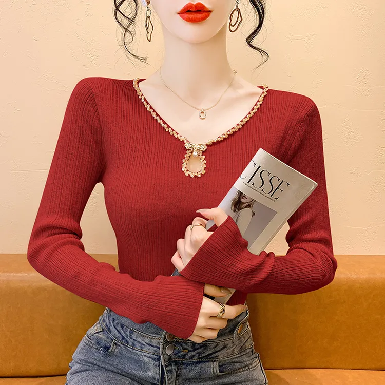 洋气镂空钉钻针织打底衫女秋冬2025新款气质别致独特修身长袖上衣
