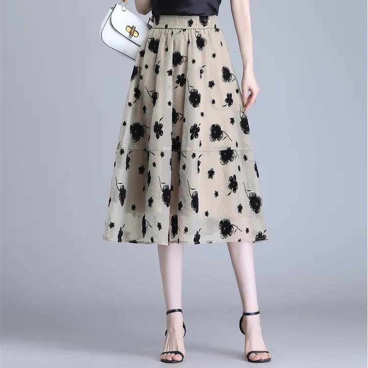 拉夏贝尔高腰显瘦半身裙2025夏季新款遮胯印花网纱裙女大码a字裙
