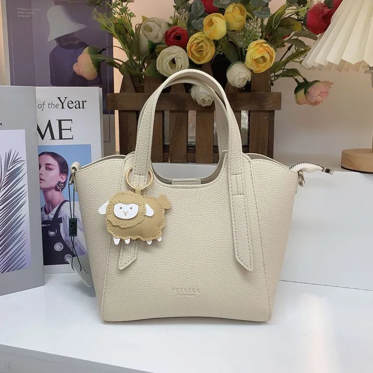 荔枝纹菜篮子包女2025秋冬新款轻奢高级气质百搭通勤手提包斜挎包