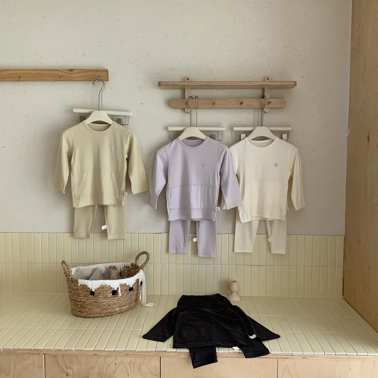 69548酷娃米秋冬新款儿童长袖净色护肚小标家居服套装