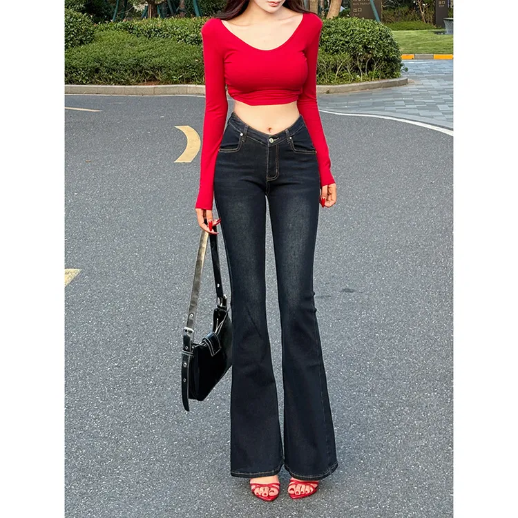 深色低腰微喇牛仔裤女2025秋季新款辣妹V腰弹力显瘦提臀喇叭长裤