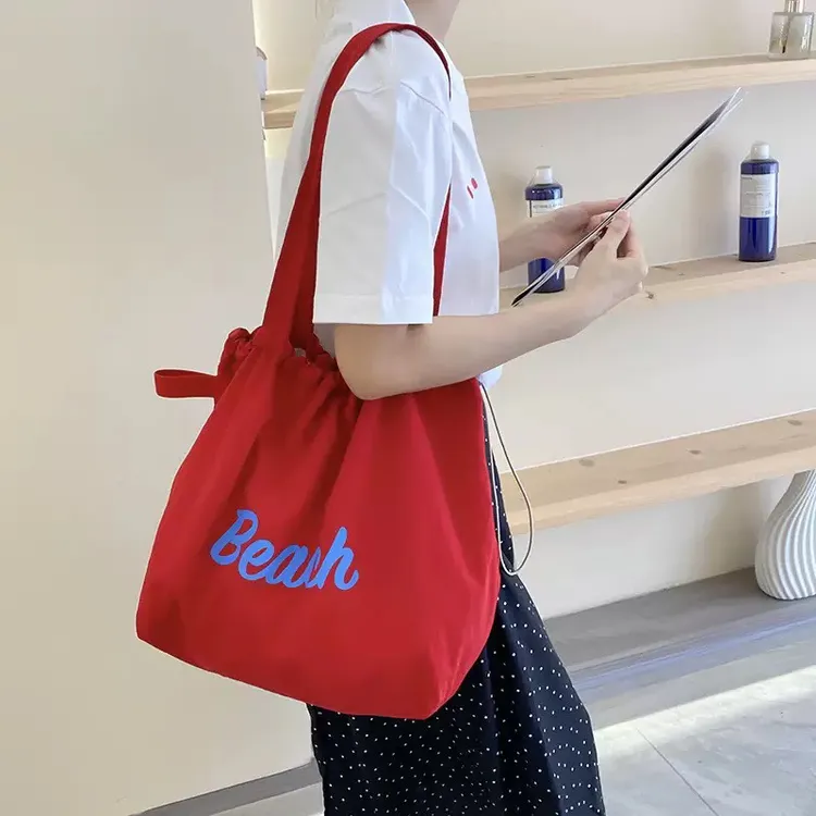 高品质版本韩版字母印花包包女大容量尼龙单肩包休闲百搭便携抽绳