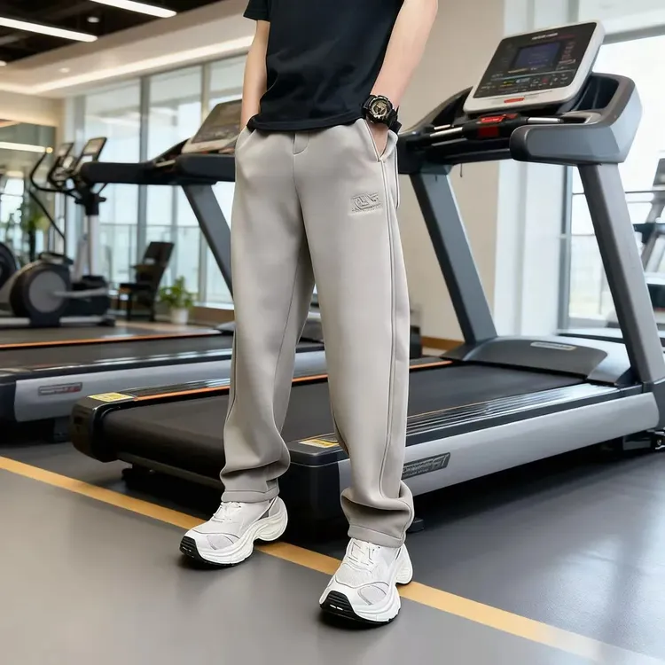 青年韩版潮流纯色休闲裤2025冬季新品加绒直筒裤加厚韩版运动卫裤