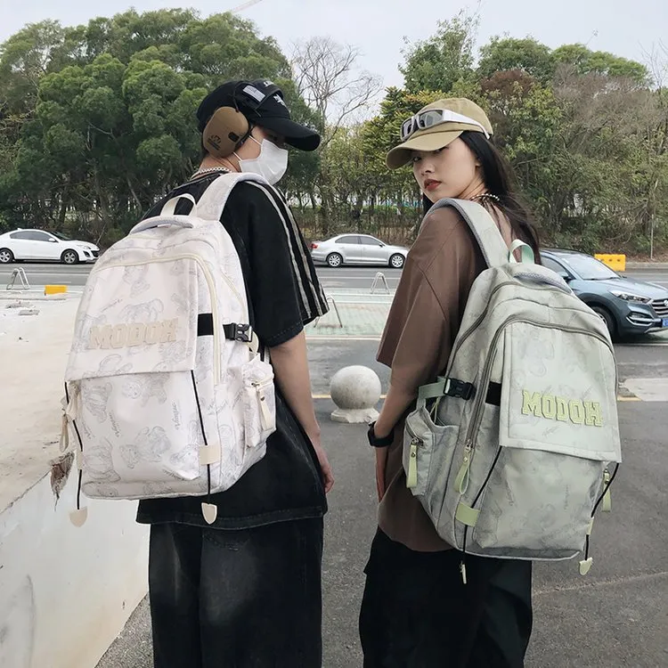 高颜值双肩包男2025新款大容量书包中学生初中生高中大学生背包女