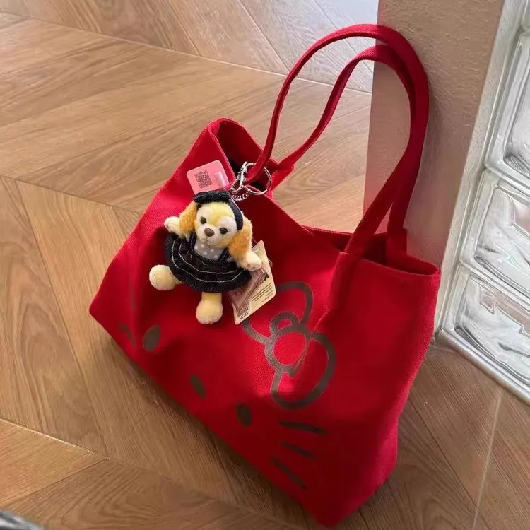 可爱猫咪帆布托特包手提单肩通勤大容量文艺学生装书大包2025新款