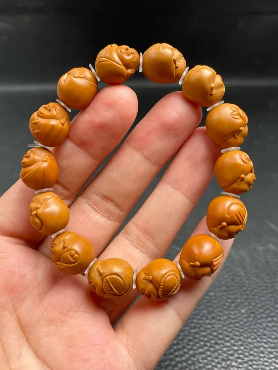 橄榄核铁核1.35弥勒佛手串