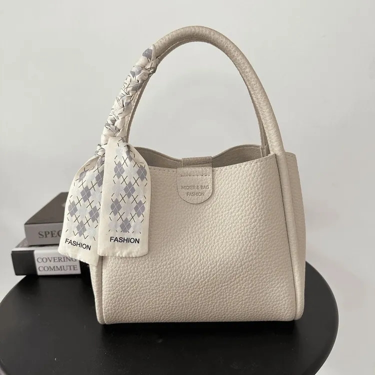 2025夏新款时尚手拎包水桶包简约小众手提包包白色女士单肩斜挎包