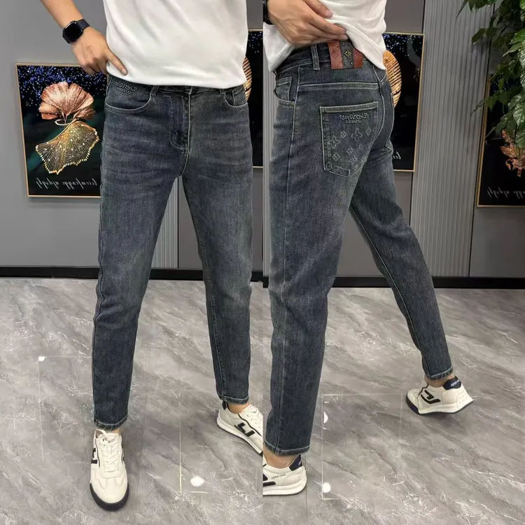 男士牛仔裤广州男裤弹力修身显瘦小直筒裤时尚裤兜印花长裤秋季款