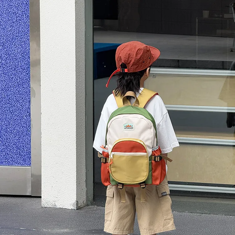 日系休闲大容量儿童双肩包2025新款百搭简约书包男女童出游背包潮