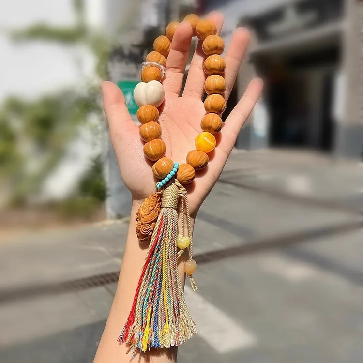 猴头屁桃手串精工雕刻原皮光面拉丝爱心屁桃猴头手持文玩佛珠手链