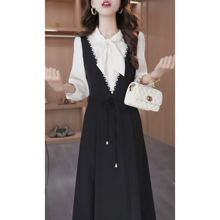 早秋季新款假两件长袖显瘦连衣裙女时尚气质设计感绑带A字裙子潮
