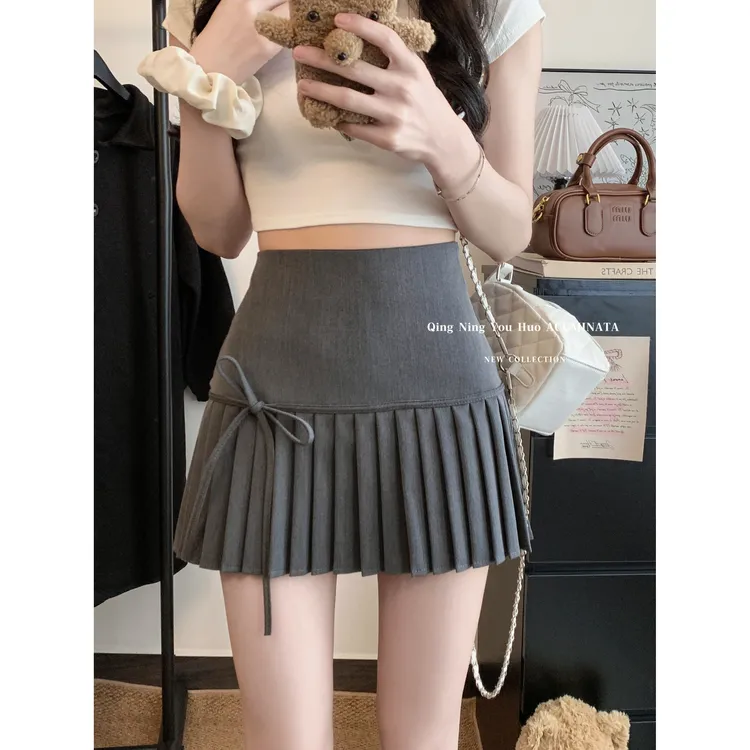 辣妹风蝴蝶结灰色半身裙女春季高腰显瘦A字裙百褶裙防走光短裙子