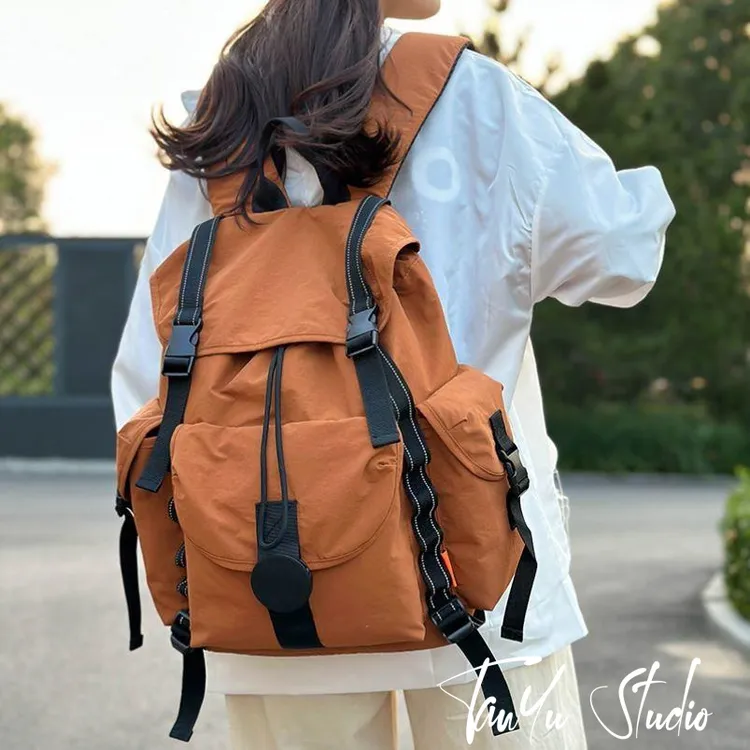 探屿户外徒步登山包女士新款轻便旅游大容量双肩包百搭旅行背包