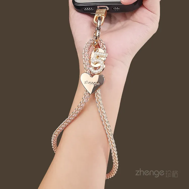 手机挂绳时尚女挂件手腕绳短款精致高级感户外旅游行防丢摔手提链