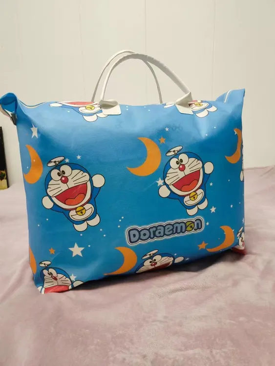 袋子印花蓝色收纳袋棉被可爱卡通被子防尘袋被子家用防水粉色