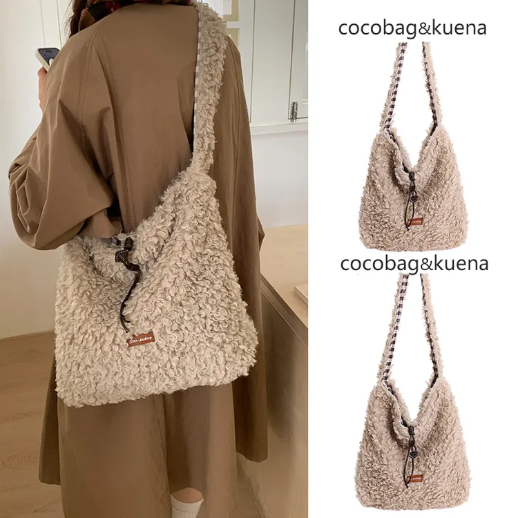 秋冬小众设计松弛感水桶包包女2025新款斜挎包大容量毛绒绒毛毛包