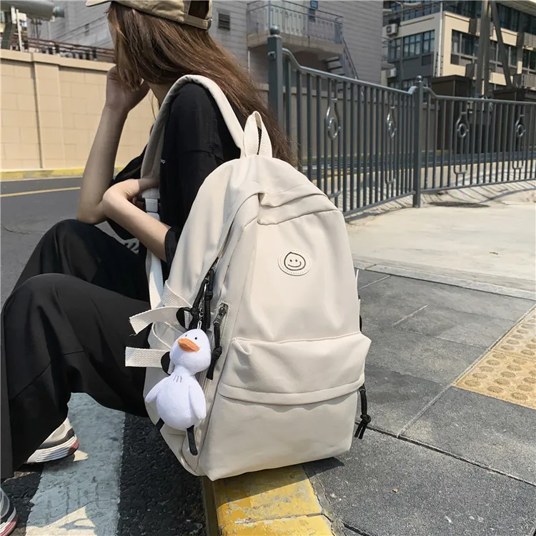 新款日系时尚百搭双肩包小型高中大学生情侣书包韩版可爱休闲背包