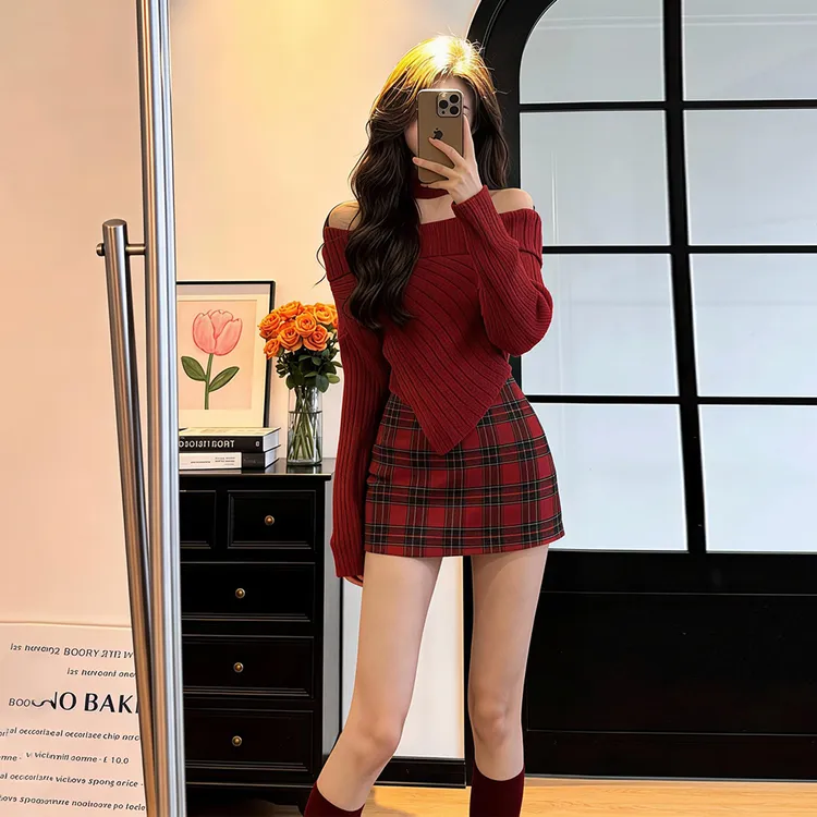 设计感纯欲辣妹女秋冬新款圣诞红挂脖不规则毛衣格纹短裙两件套装