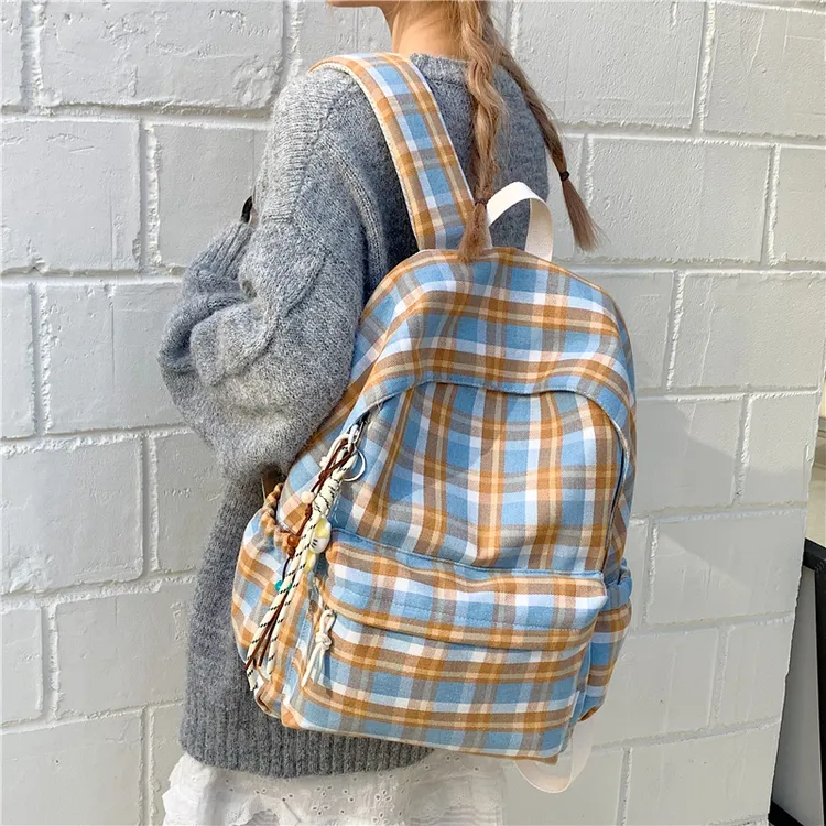 新款书包初中女生双肩包韩系ins轻便休闲高中生书包百搭格子背包