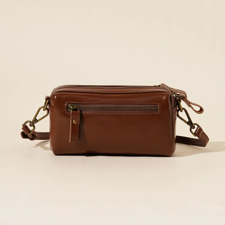 岩牛百搭软纯色复古英伦风休闲斜挎包YN3647