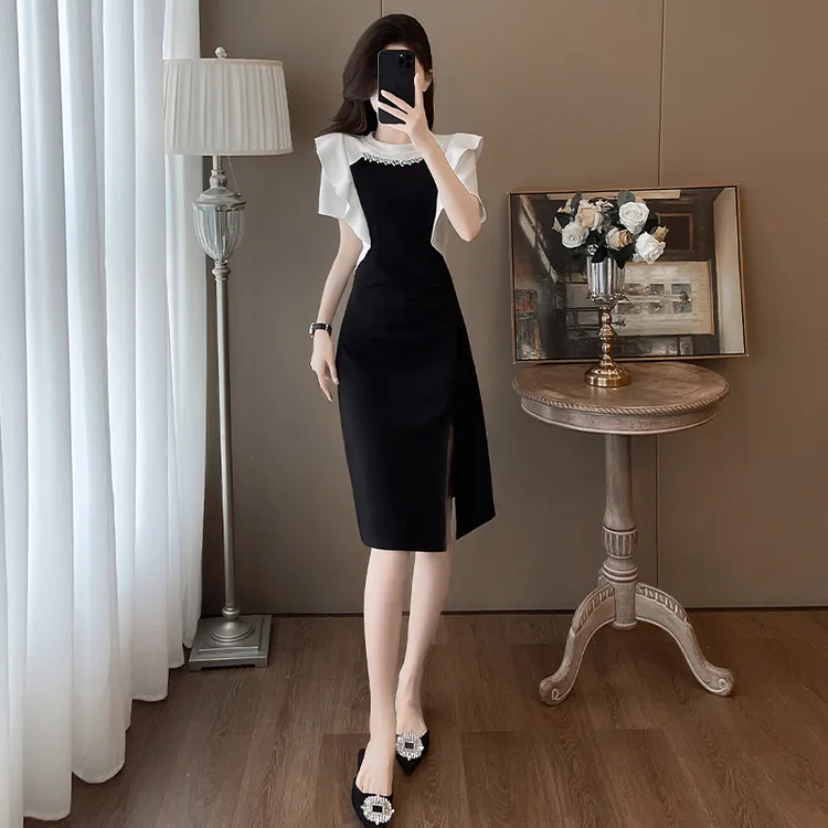 2025轻奢过膝半身连衣裙黑色夏季法式新款高级气质修身裙子开叉