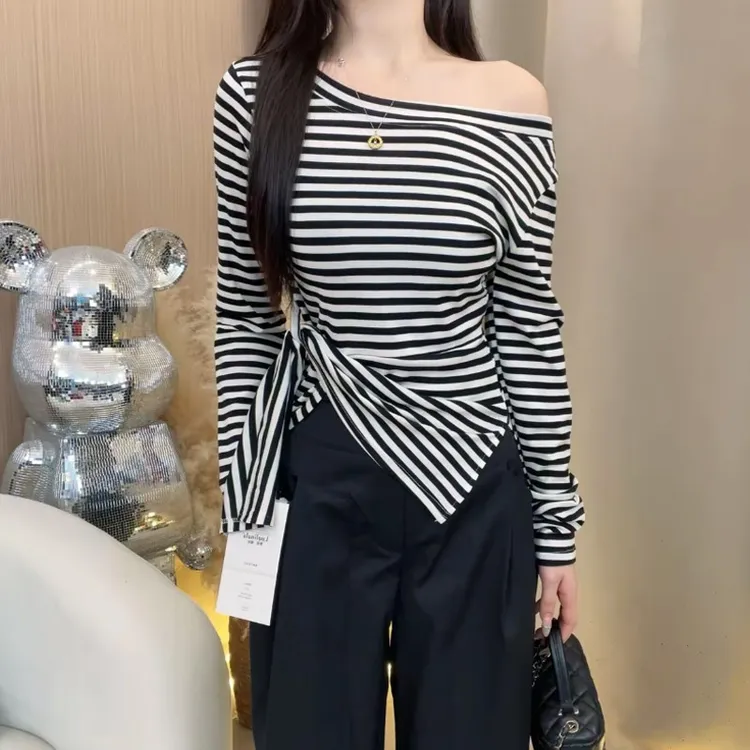 芙慕2025早秋新款韩系下摆不规则开叉收腰设计感百搭显瘦斜肩上衣