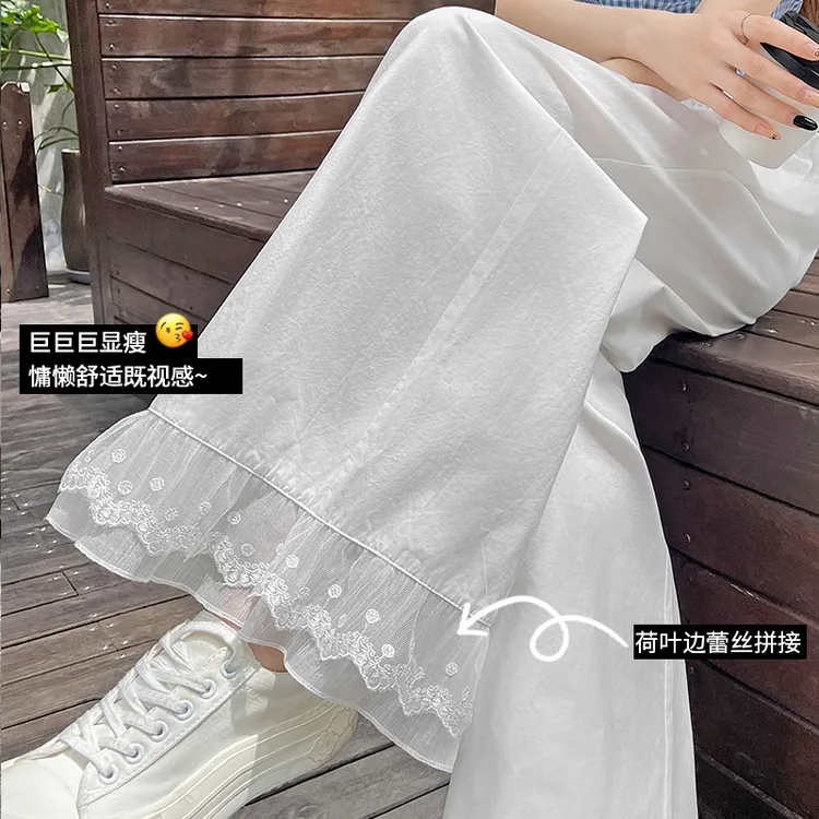 慵懒蕾丝拼接冰丝阔腿裤子女夏季薄款松紧腰白色休闲花苞奶奶裤裙