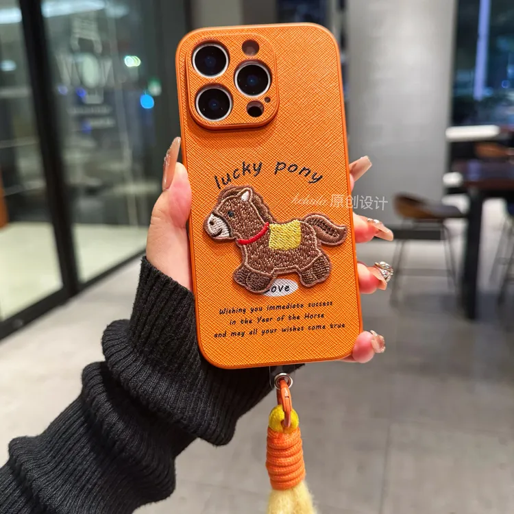 适用苹果华为荣耀OPPO小米VIVO手机壳橙色磨砂皮纹立体刺绣小马