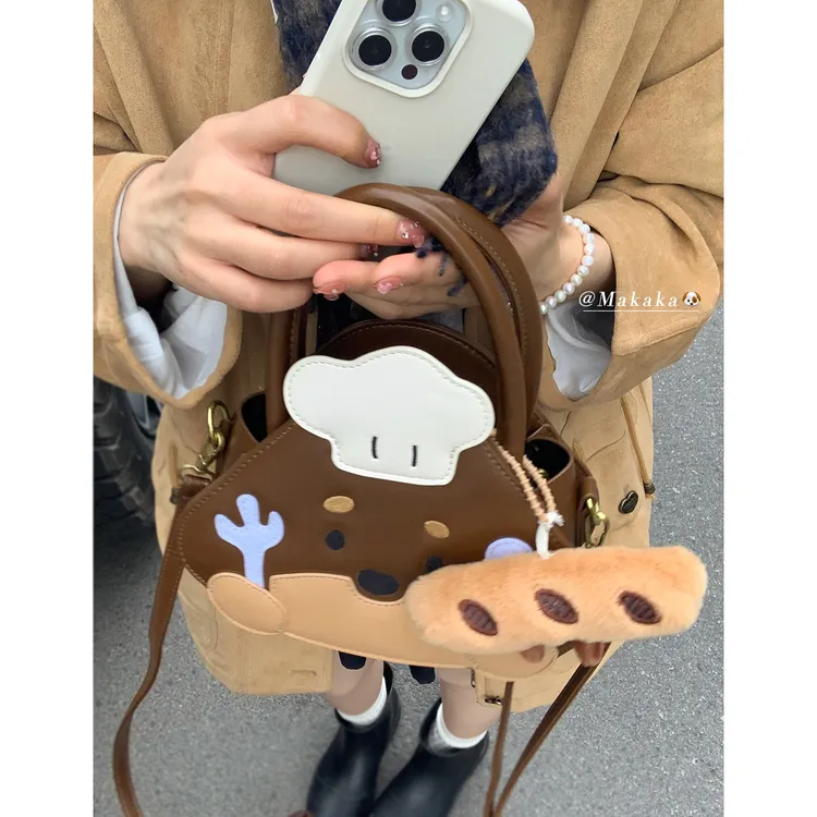 原创可爱手提包包女款爆款2025新款秋冬时尚手拎包韩系卡通斜挎包