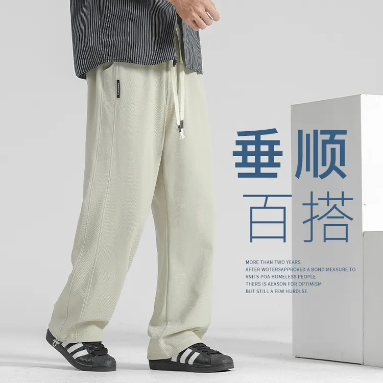 男裤2025秋季新款卡其色抽绳裤子男士垂感休闲裤运动卫裤痞帅男装