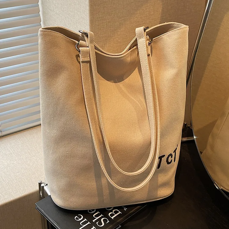 简约休闲帆布包包女2025新款夏季大容量学生托特包百搭慵懒单肩包
