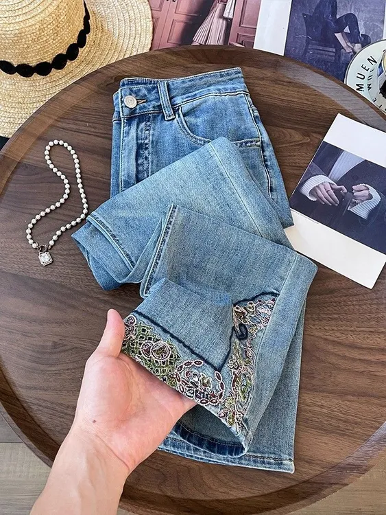 新中式通勤国风微喇牛仔裤女2025夏季蓝色刺绣高腰复古显瘦阔腿裤