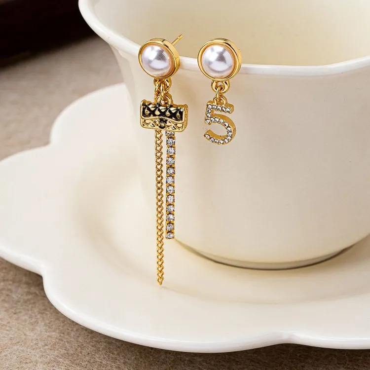 铜合金锆石耳饰 QIAN XI S925银针 轻奢法式耳钉包包AB款流苏耳环