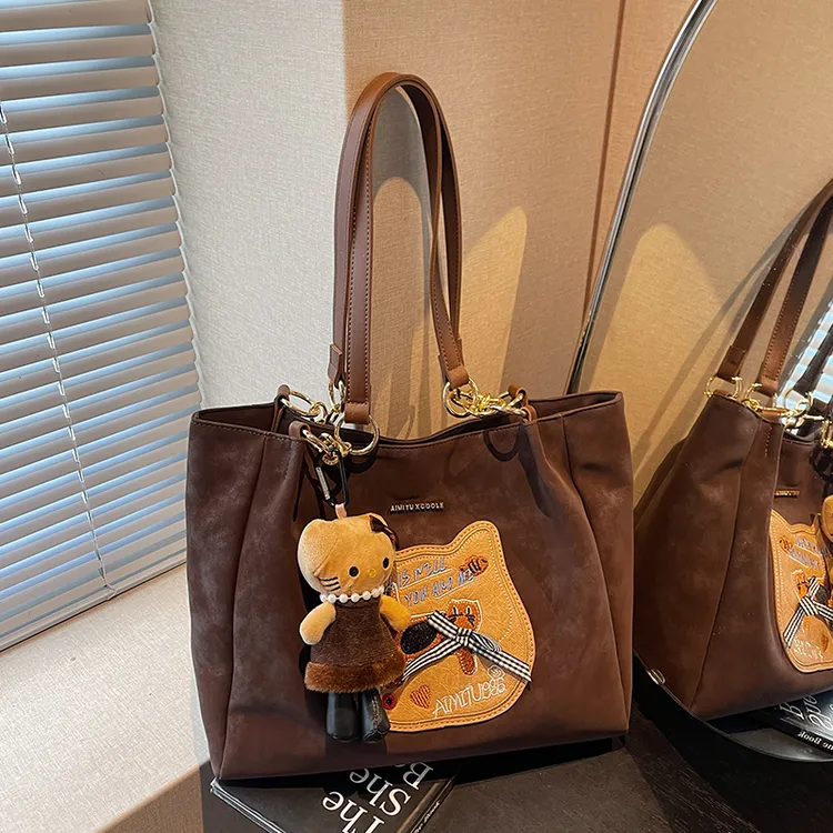 艾米兔 X COOLE女包2025新款通勤百搭大容量小众设计潮流单肩包