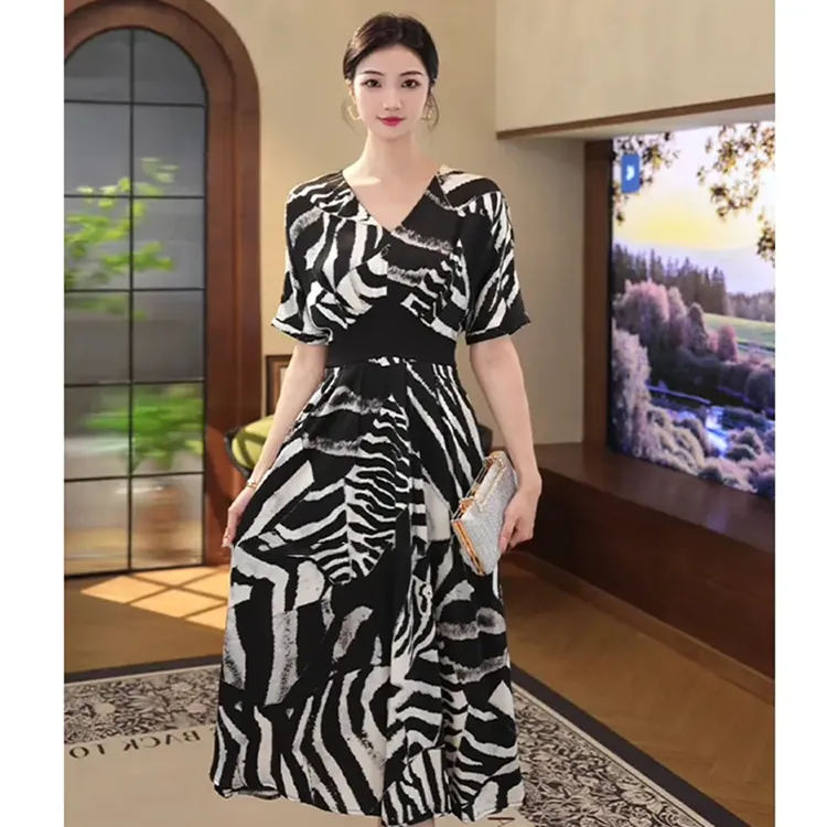 2025夏季新款气质小众茶歇中长裙休闲时尚收腰显瘦连衣裙子D1185