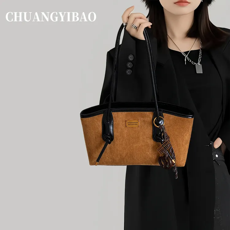 复古麂皮手提法棍包包女式2025新款秋冬高级感小众质感通勤腋下包