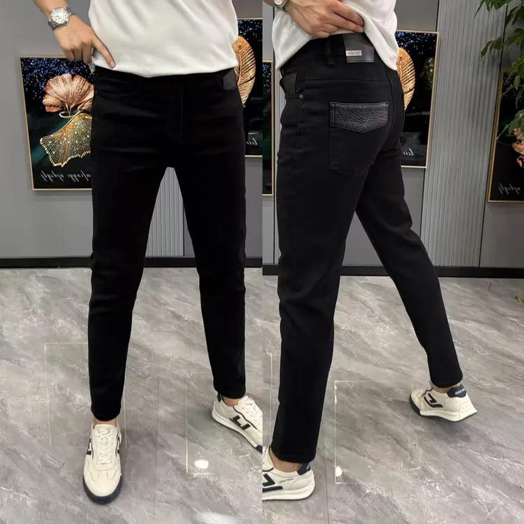 黑色牛仔裤广州新款男裤时尚裤兜拼皮牛仔裤男款爆款2025新款