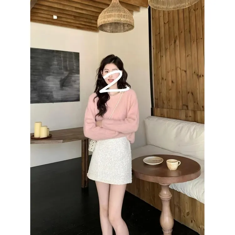 1法式温柔风镂空珍珠挂脖针织毛衣女装秋冬季新款长袖开衫气质