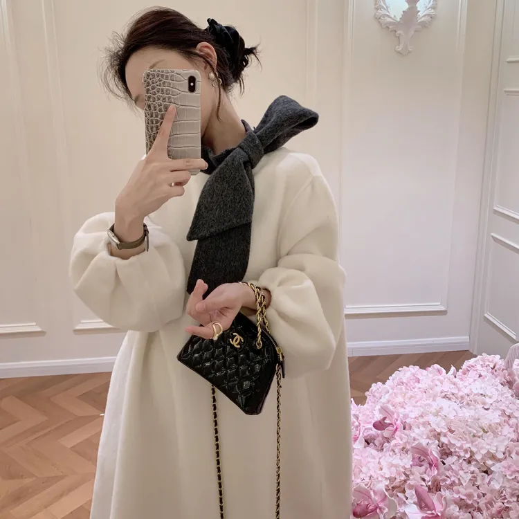韩系黑白撞色蝴蝶结毛呢连衣裙秋冬季富家千金赫本风设计感中长款