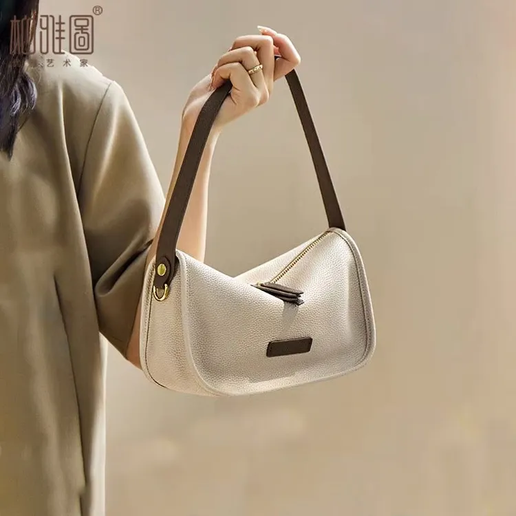 新疆西藏包邮柏雅图包包女2025新款高级感腋下包法棍水晶法棍女包