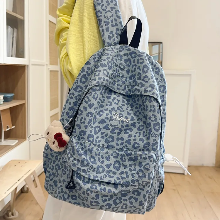 豹纹双肩包女原创小众设计韩版旅行背包简约初中高中生大学生书包