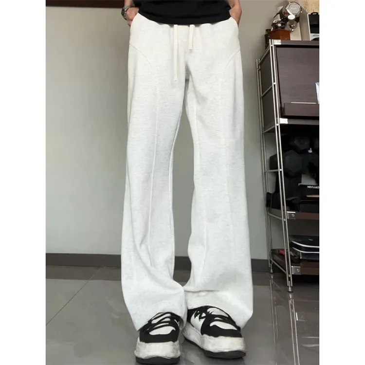 美式斜切微喇弯刀拼接卫裤男女秋季新款百搭宽松帅气直筒休闲裤子