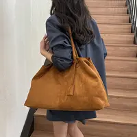 高级感通勤托特包包女式2025新款秋冬麂皮绒大容量手提旅行单肩包