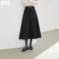 对白黑色A字半身裙女2025冬季新款气质优雅通勤显瘦大摆中长伞裙