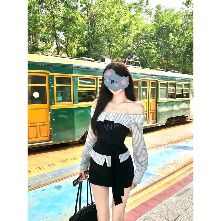 早秋长袖一字肩设计感拼接百搭条纹上衣黑色显瘦半身裙时尚套装