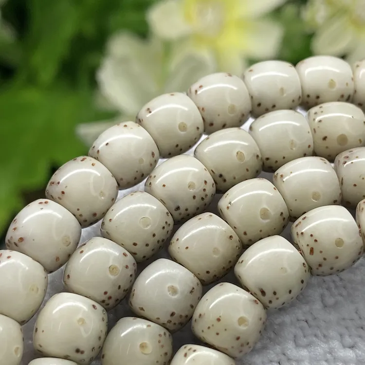 VC7601同树同枝星月菩提毛感石玉料7x6mm鼓珠半壁大留白长串